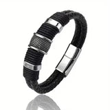 Black braided leather bracelet with silver metal accents on a white background