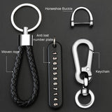 Keychain set with woven rope, horseshoe buckle, anti-lost number plate, and keychain on a black background.