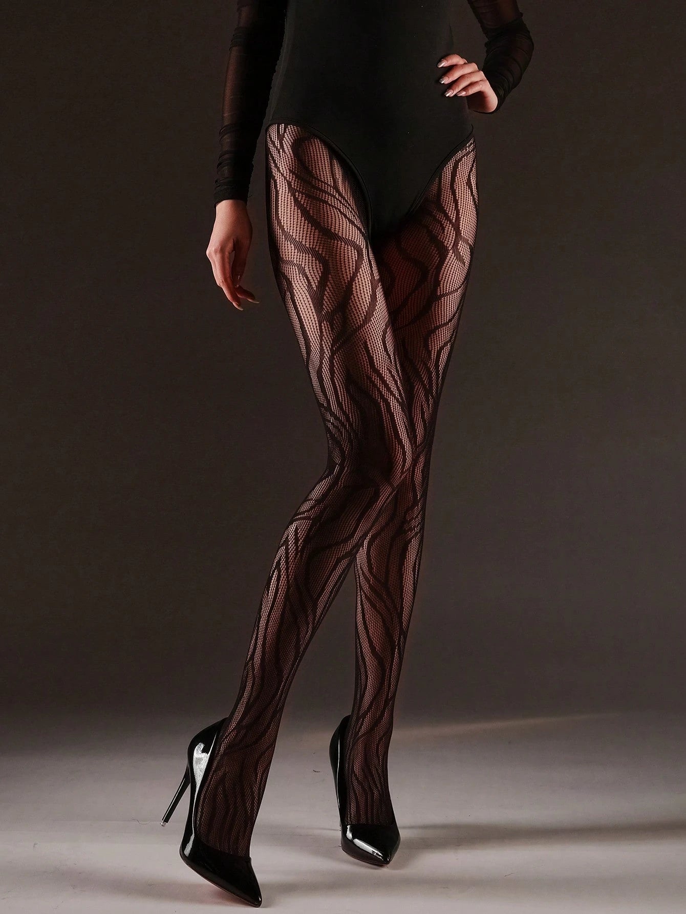 SHEIN [DazzleLegs] بنطلون ضيق ضيق بنمط جلد النمر شبكي عالي المرونة قطعة واحدة للنساء