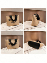 Woven beach bag with black handle and 'BEACH PLEASE' text on a bed.