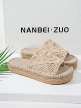 Beige espadrille sandals with woven design on a white background with 'NANBEI ZUO' branding.