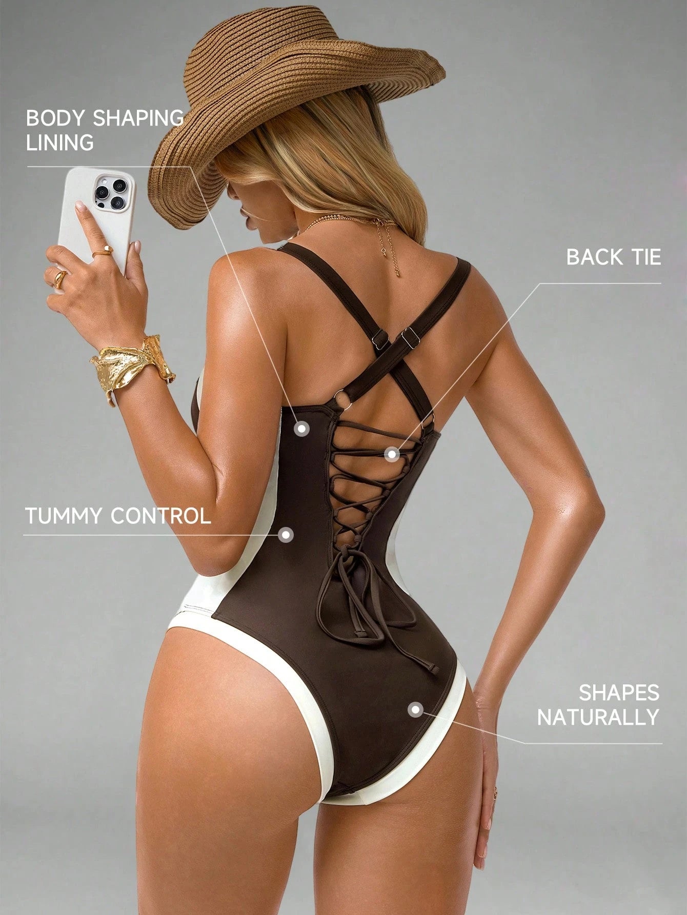 Woman wearing a brown swimsuit with features highlighted on a gray background