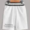 SHEIN Boys Slogan Graphic Striped Tape Shorts