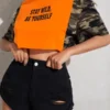 SHEIN Slogan Graphic Camo Sleeve Crop Top